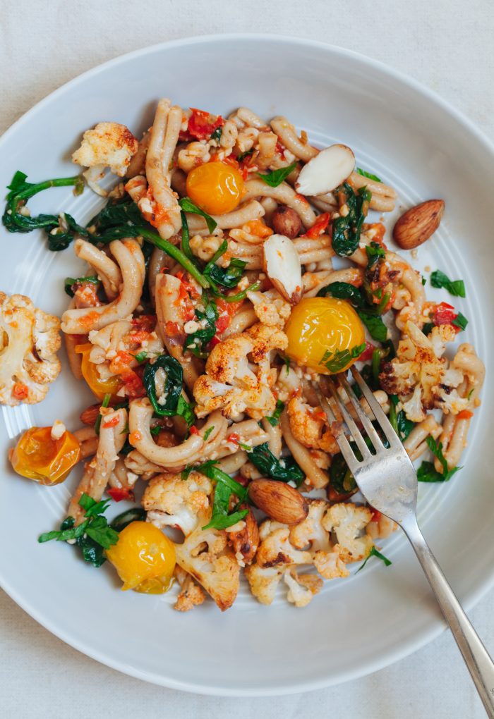 Sprouted Almond Romesco Pasta with Roasted Cauliflower and Blistered Tomatoes