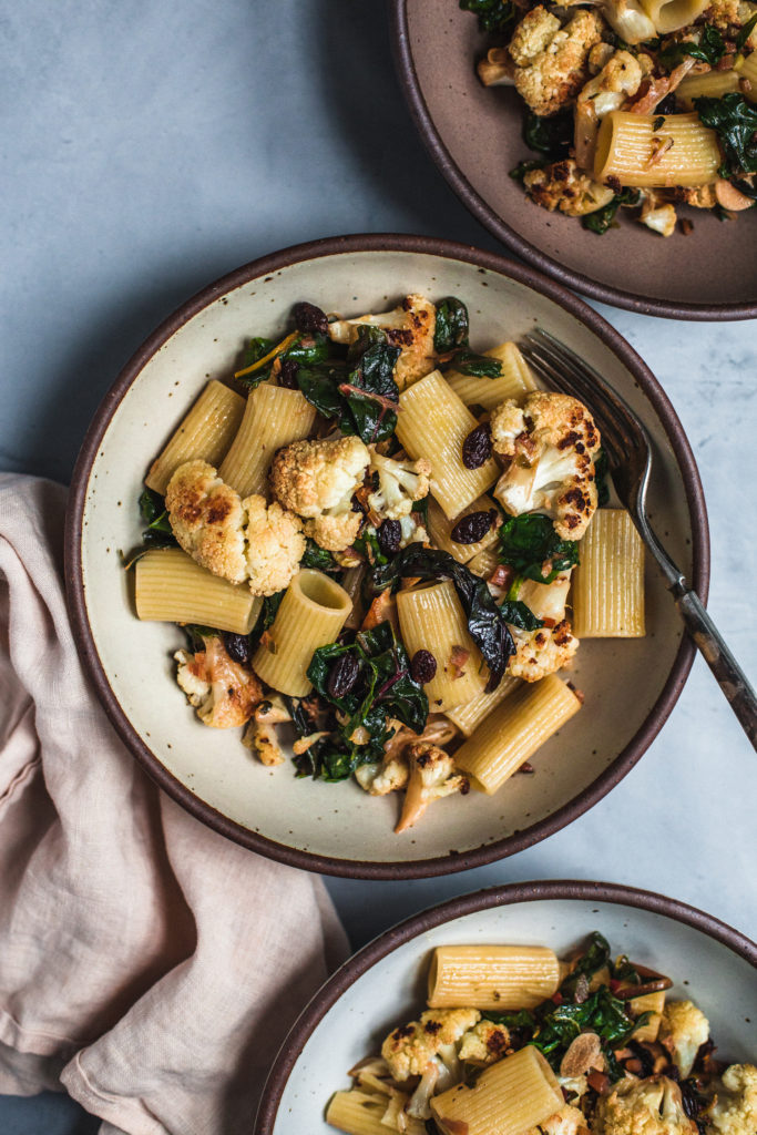 Roasted Cauliflower Pasta with Raisins, Capers, and Chard